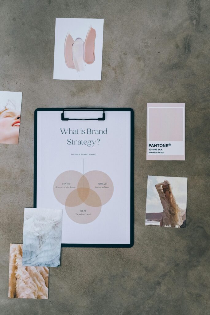 pexels photo 7598021 7598021 Flat lay of a brand strategy board surrounded by mood and color swatches on concrete.