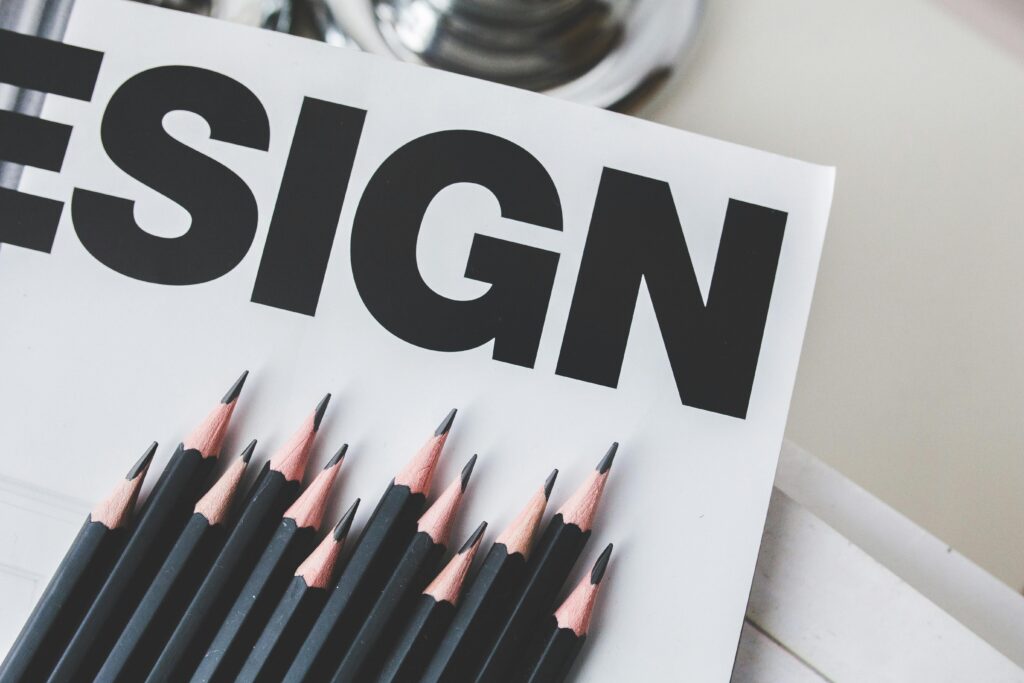 sign pencil black pencils 6445 Close-up of black pencils on a design magazine cover, ideal for creative projects.